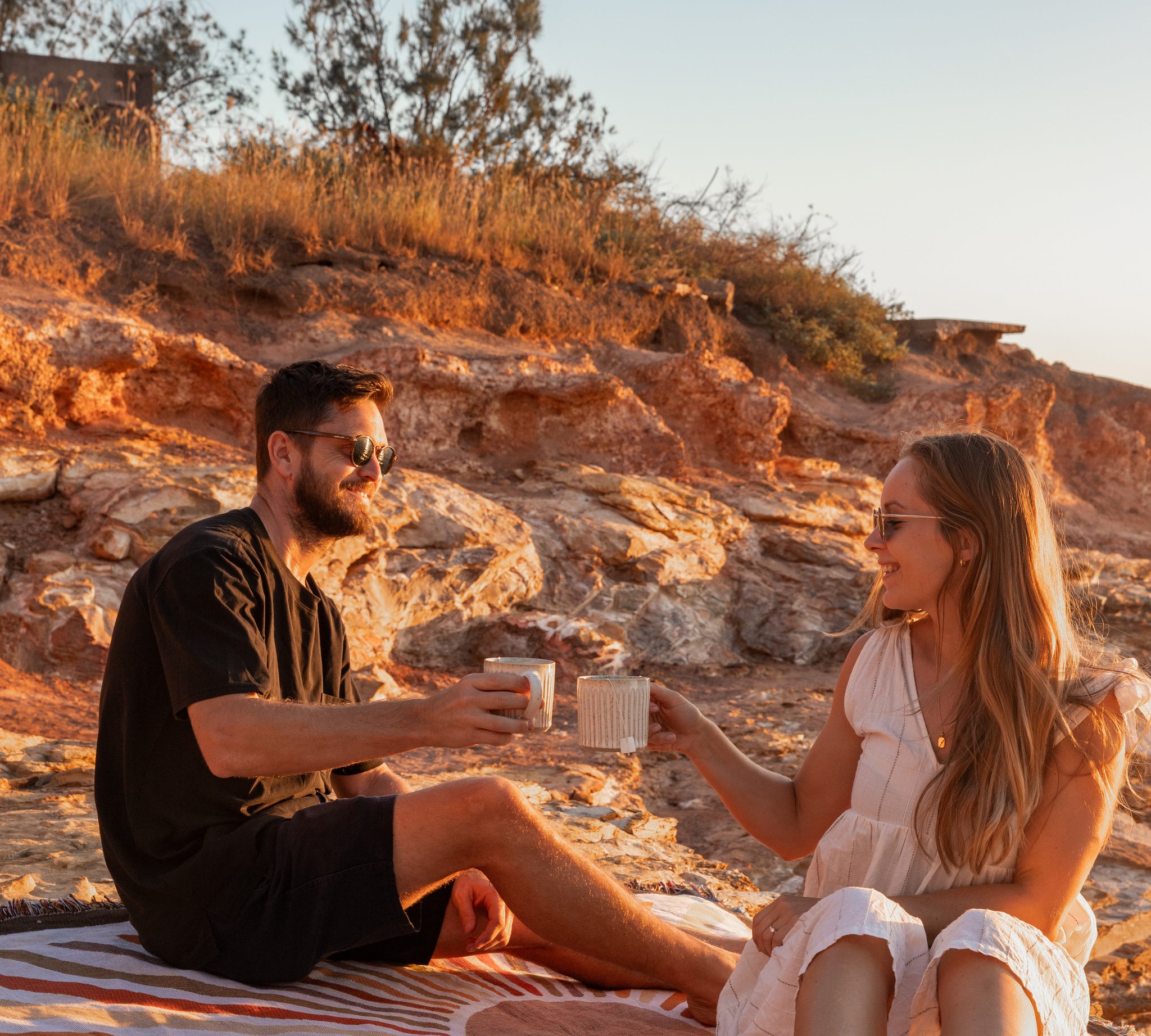 TEA MATE Australia - Couple Drinking Tea Bags At Sunset