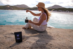 TEA MATE Australia - Female sitting at beach lookout drinking tea bag